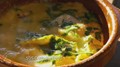 Baked Taleggio eggs with preserved lemon and parsley