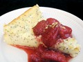 Buttermilk poppyseed custard cake with roasted strawberries