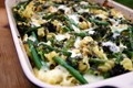 Cheesy pasta bake with broccoli, green beans and linseed