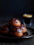 Chocolate profiteroles with chocolate passionfruit pastry cream