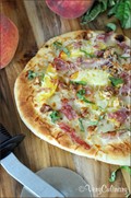 Grilled peach and coppa pizza