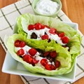 Ground beef gyro meatball lettuce wraps with tzatziki and tomatoes