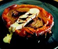 Onion tarts with Taleggio cheese