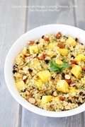 Quinoa salad with mango, currants, almonds, & mint