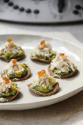 Quinoa tostadas with crab, avocado and popcorn dust