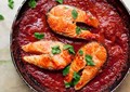 Salmon steaks with spicy tomato sauce